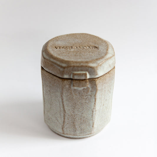 Frosted Pine 140 g candle in a handmade gray-white ceramic vessel