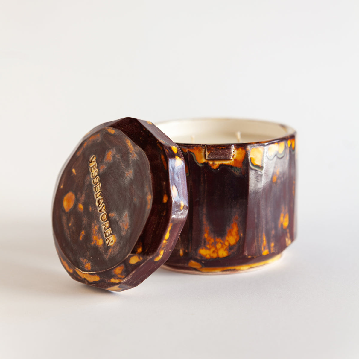 Vanilla Smoke 260 g candle in a handmade amber ceramic vessel