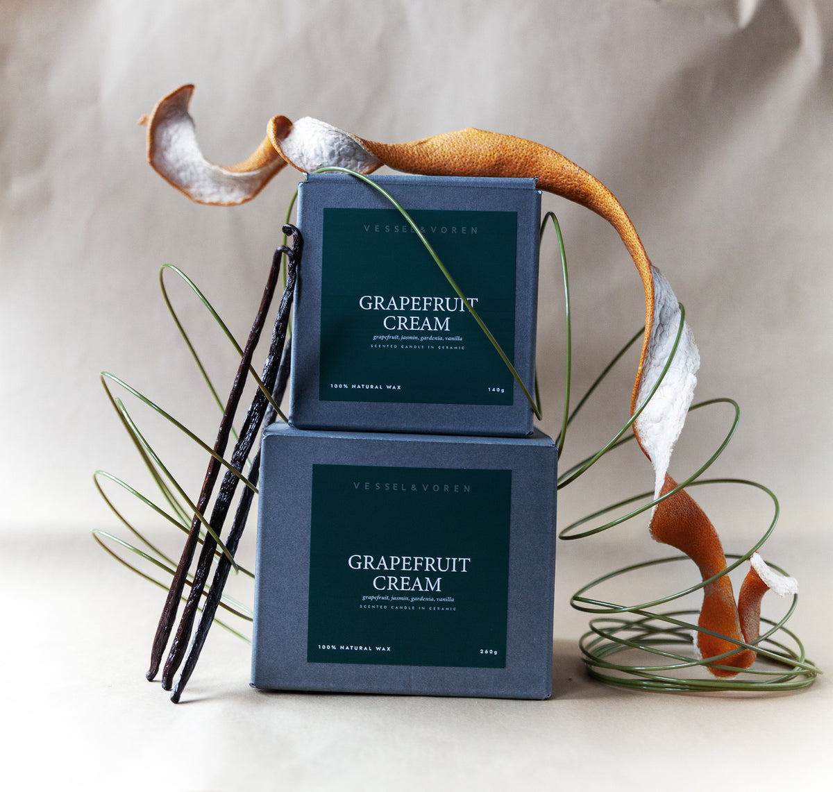 Grapefruit Cream 260 g candle in a handmade green ceramic vessel