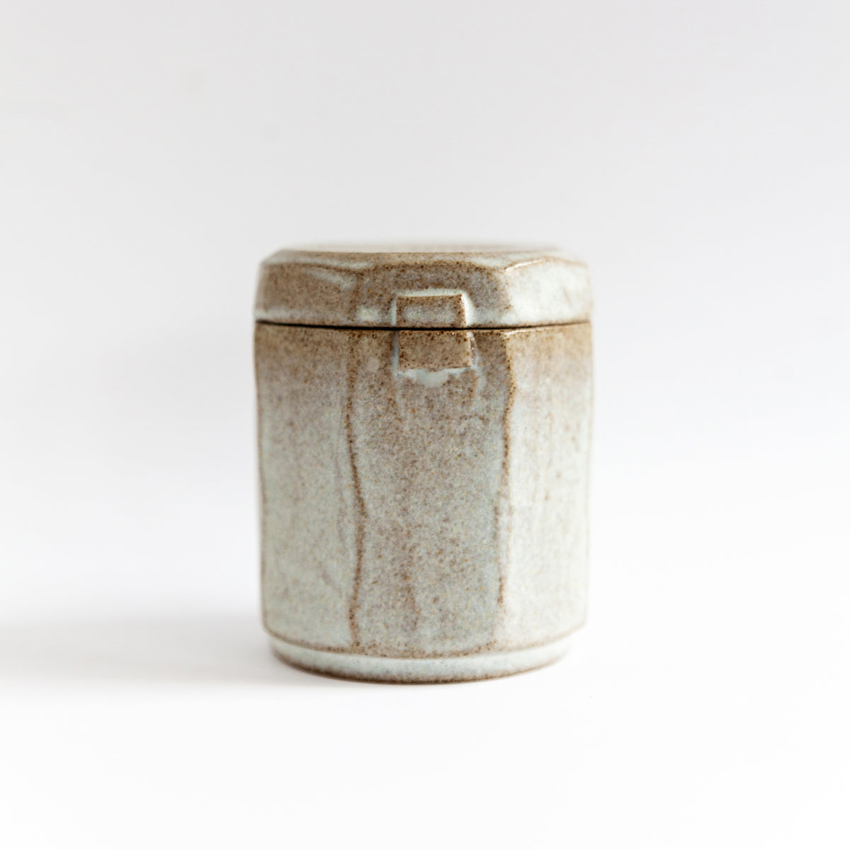 Frosted Pine 140 g candle in a handmade gray-white ceramic vessel