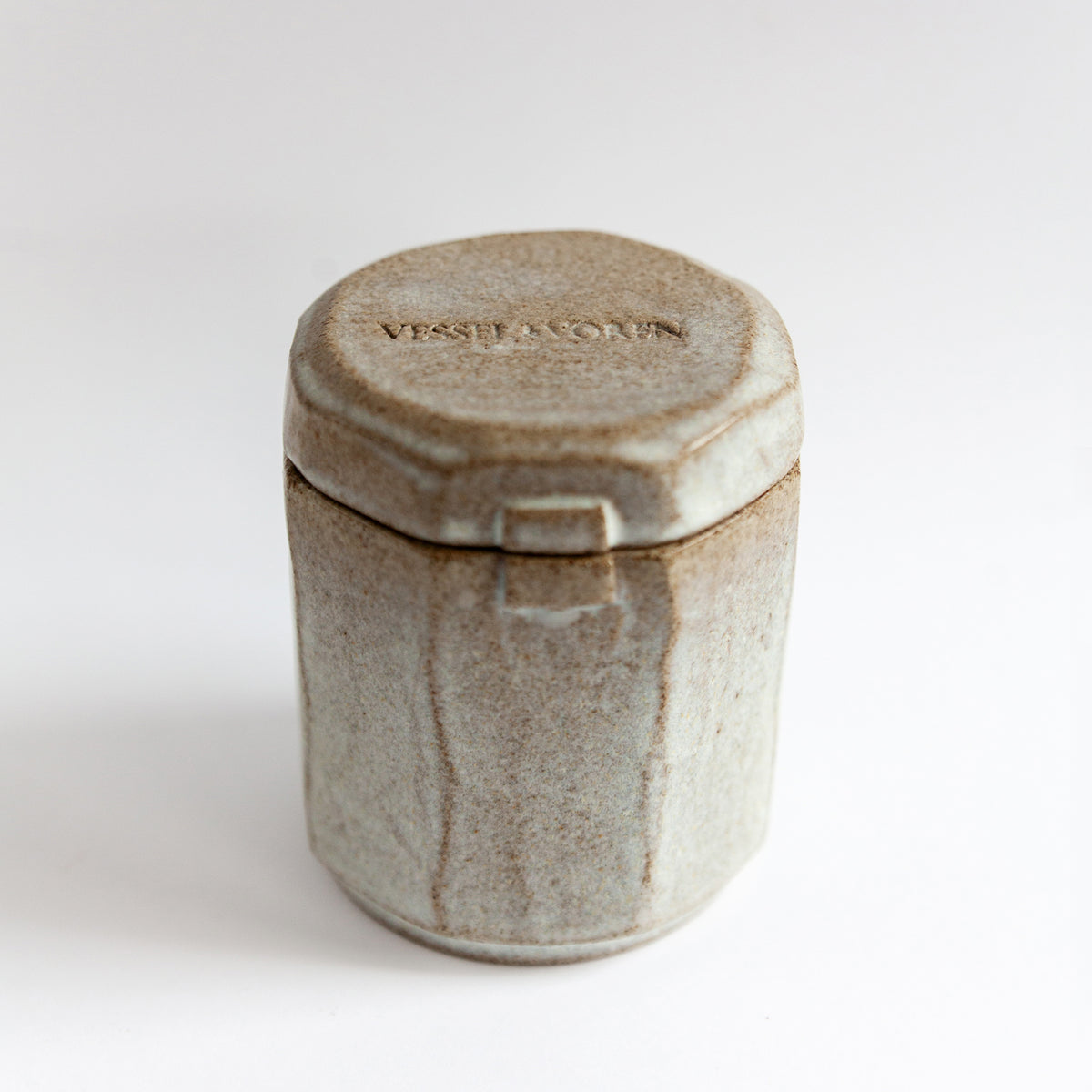 Frosted Pine 140 g candle in a handmade gray-white ceramic vessel