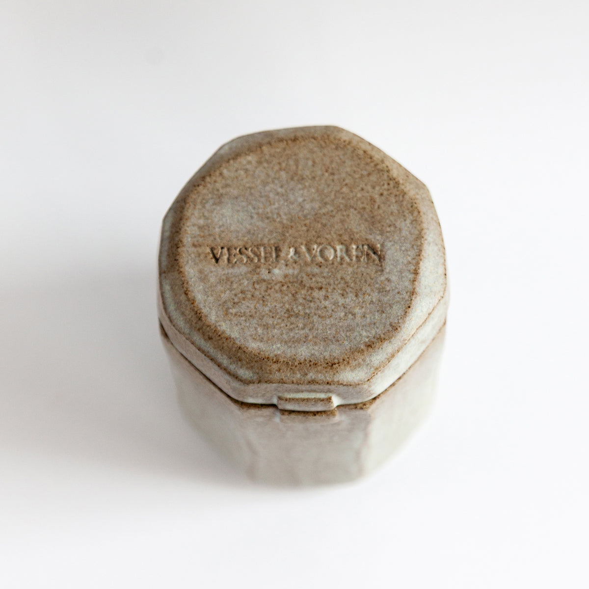 Frosted Pine 140 g candle in a handmade gray-white ceramic vessel