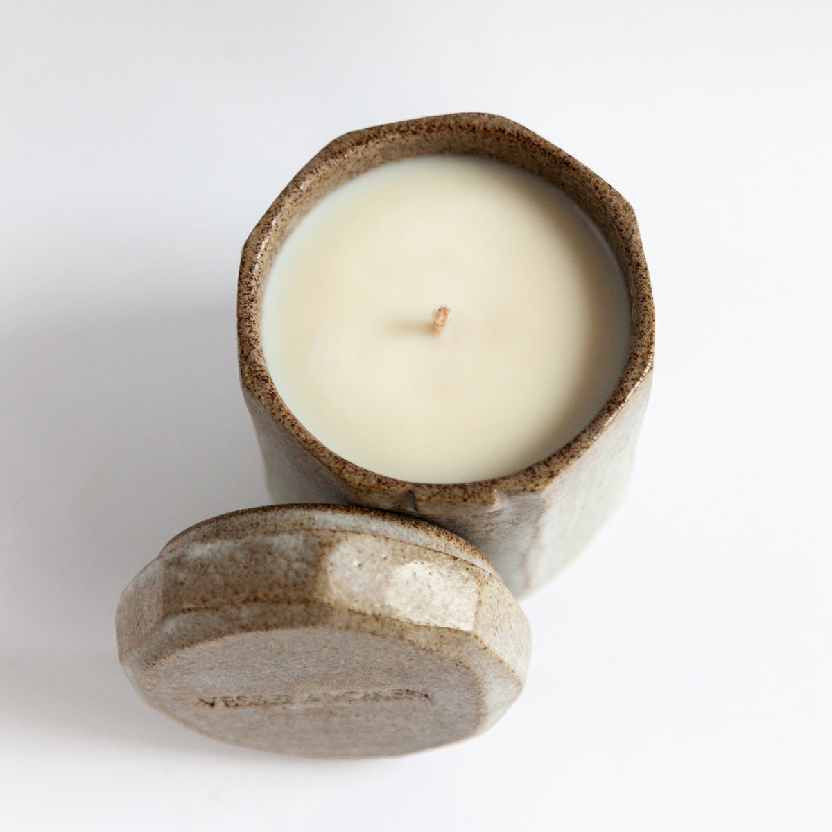 Frosted Pine 140 g candle in a handmade gray-white ceramic vessel