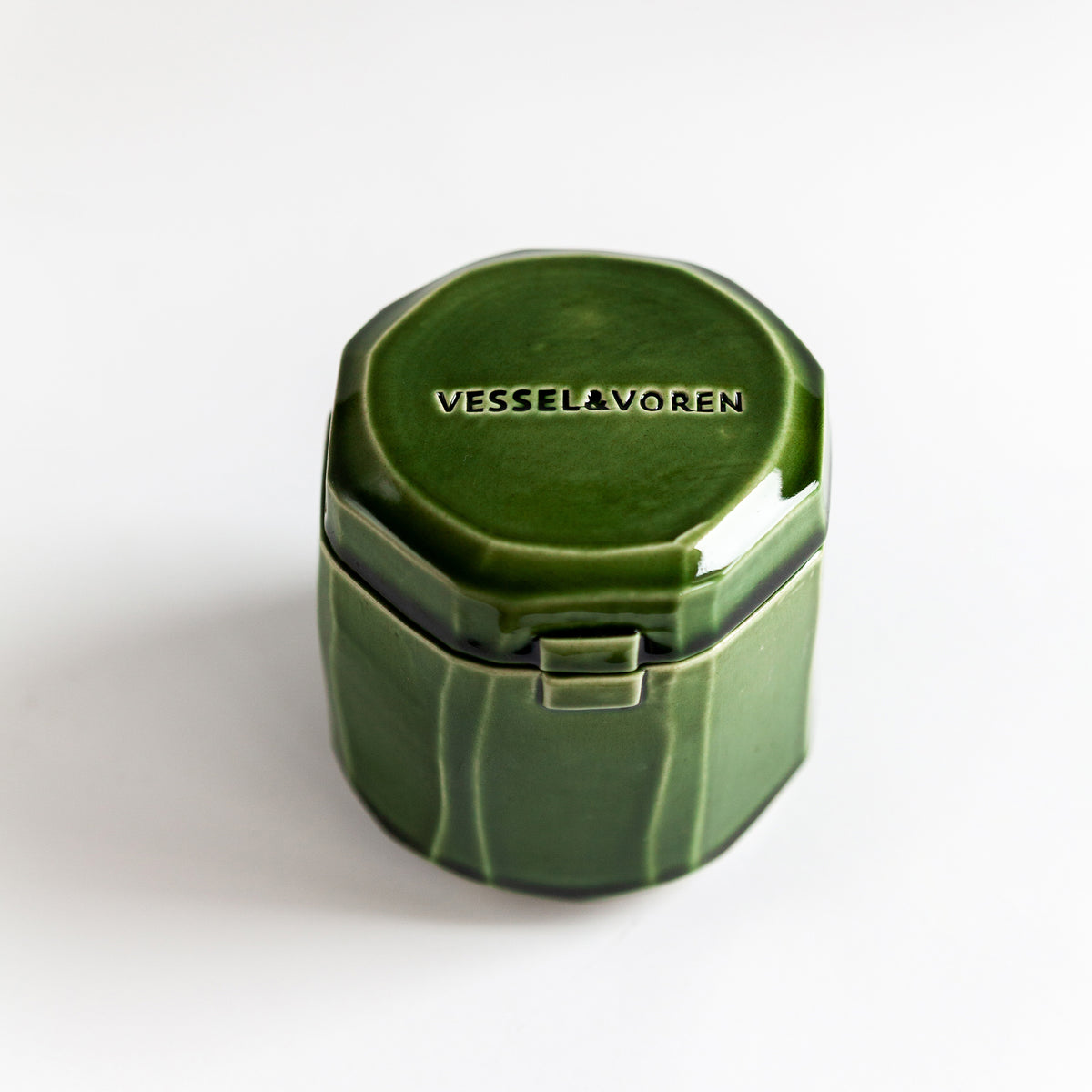 Grapefruit Cream 260 g candle in a handmade green ceramic vessel