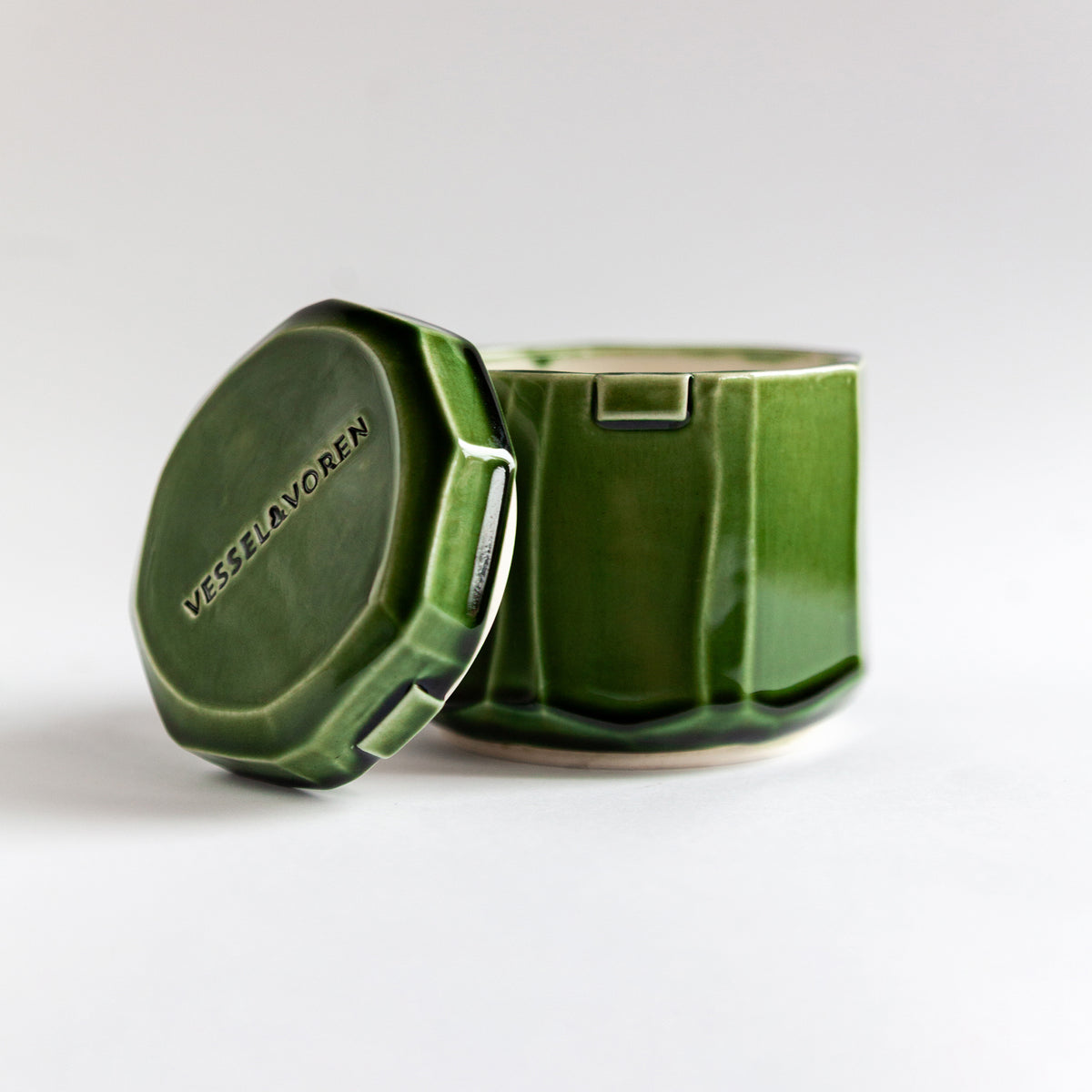 Grapefruit Cream 260 g candle in a handmade green ceramic vessel