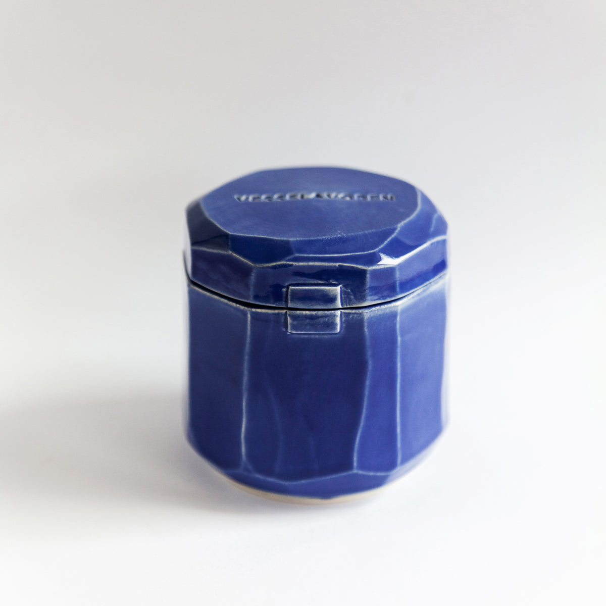 Cedar Fig 260 g candle in a handmade cobalt ceramic vessel