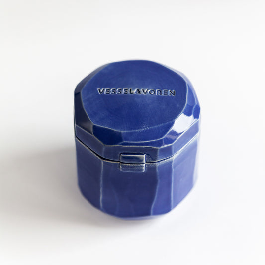 Cedar Fig 260 g candle in a handmade cobalt ceramic vessel