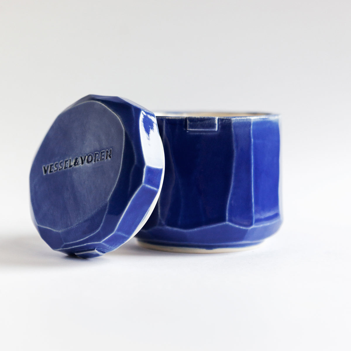 Cedar Fig 260 g candle in a handmade cobalt ceramic vessel