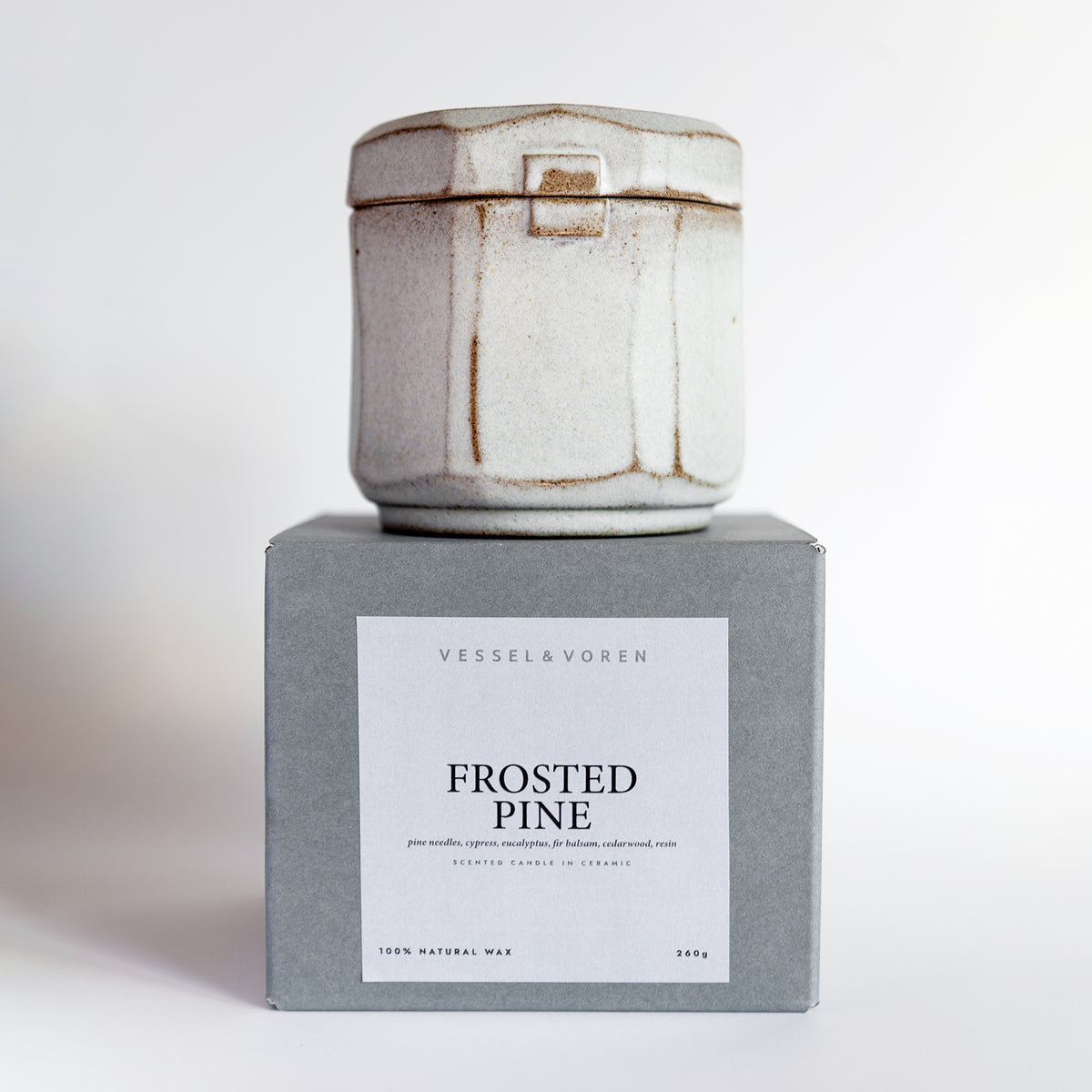 Frosted Pine 260 g candle in a handmade gray-white ceramic vessel